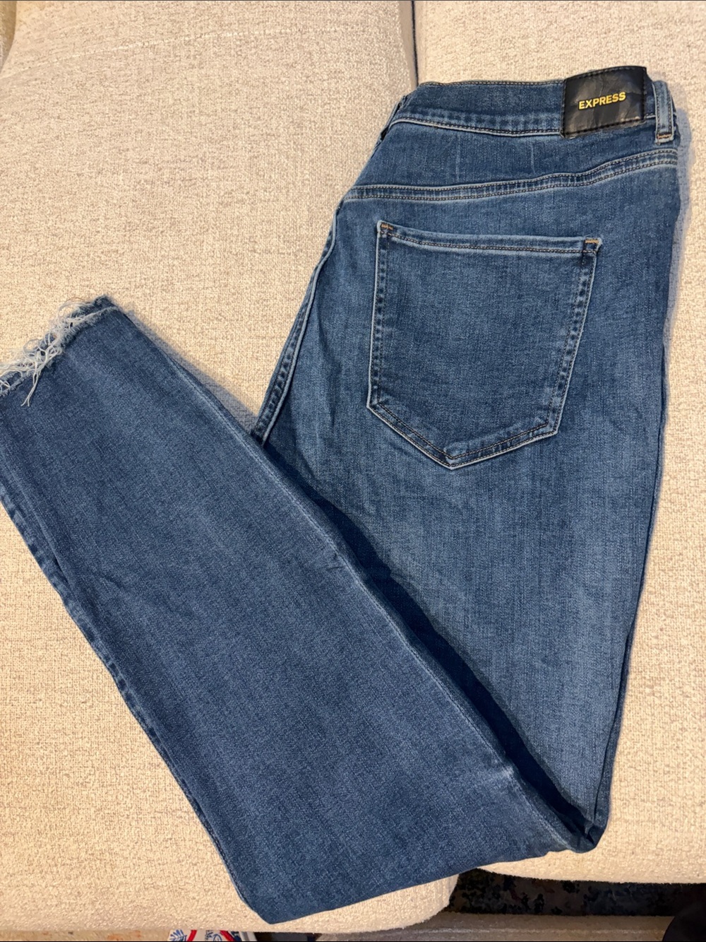 Express Skinny Jeans in Medium Blue Denim with Frayed Ankles